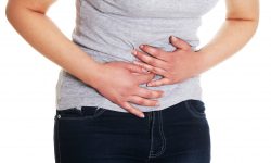 Woman heaving belly ache,  isolated on white background